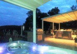 Pergola next to pool