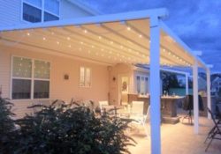 White pergola with lights