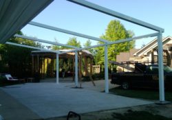 Pergola Frame of powder coated aluminum for the largest retractable awning in the USA is installed in one day.