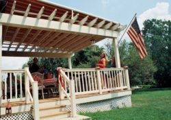 Pergola with retractable fabric