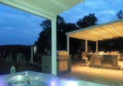 Patio with hot tub and grill