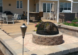 Fire Pit with patio, sitting wall and lighting is today's campfire.