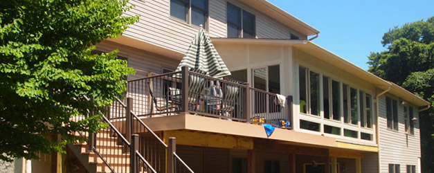 Elevated patio with sitting area and steps