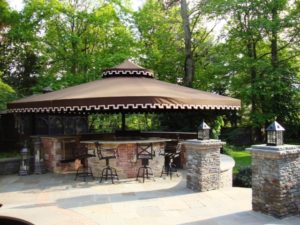 A Bar, Grille & Kitchen by the pool with color & Style