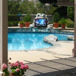 With Poolside Outdoor Television you can watch TV while you cool off in the water!