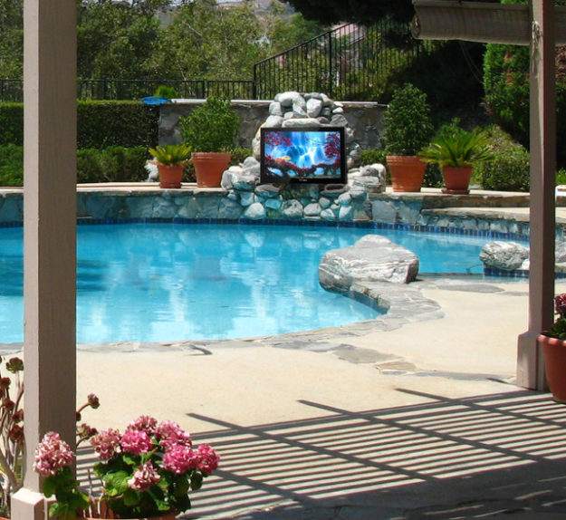 With Poolside Outdoor Television you can watch TV while you cool off in the water!
