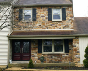 stone house with a new front door