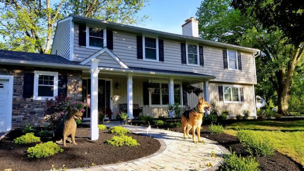 after exterior remodel in Chester Springs with dog standing out front